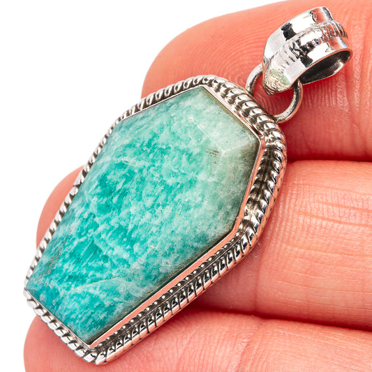 Amazonite gemstone pendant in sterling silver bezel, rectangular stone with textured border