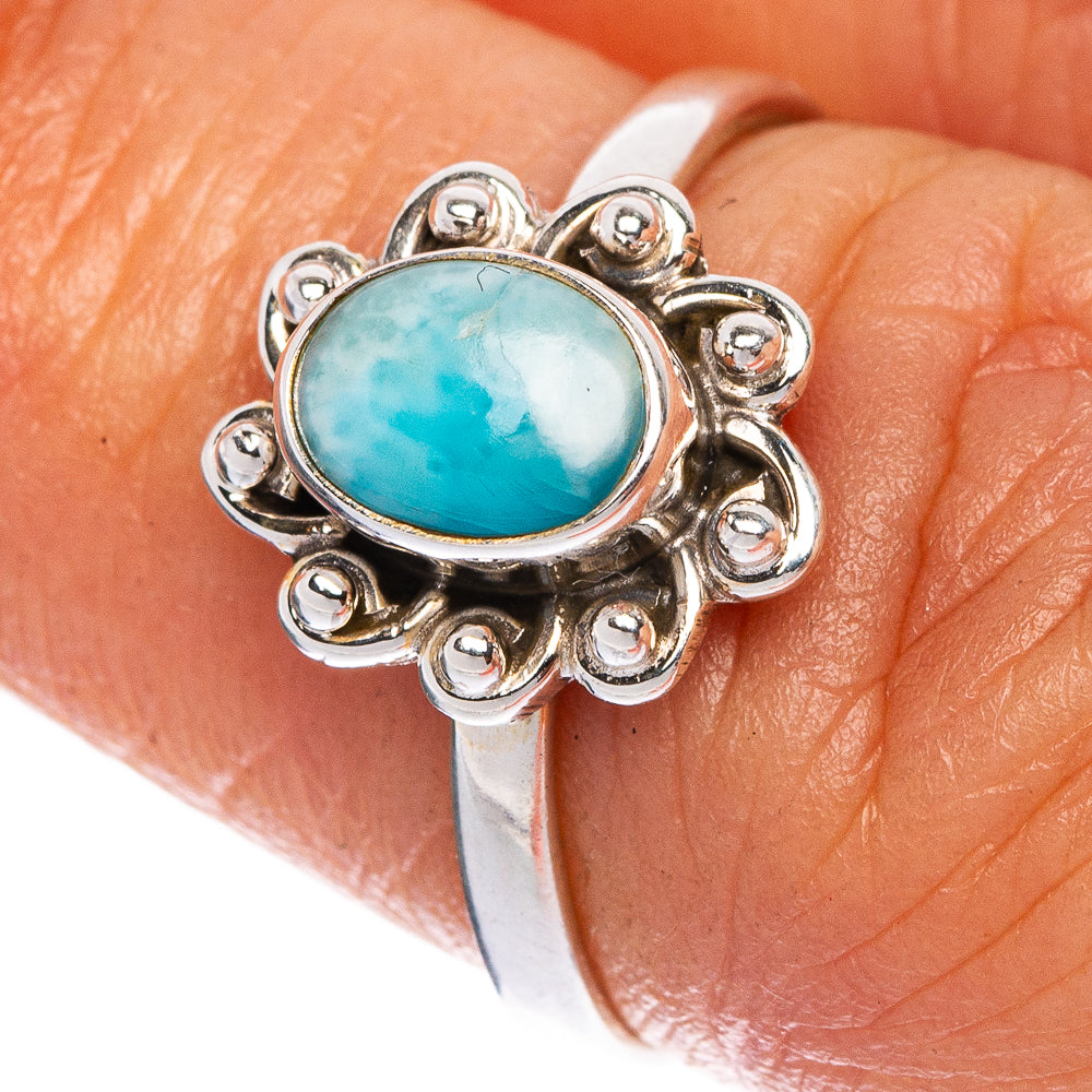 Sterling silver ring with oval turquoise Larimar stone and scalloped halo setting