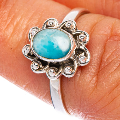 Sterling silver ring with oval turquoise Larimar stone and scalloped halo setting