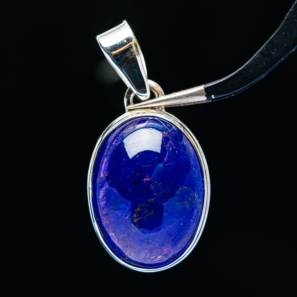 Oval blue tanzanite pendant in .925 sterling silver, polished bezel setting.