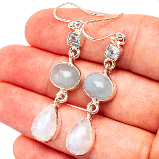 Sterling silver drop earrings with iridescent blue stones: square top, round and teardrops