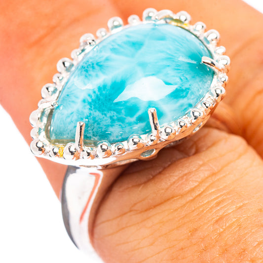Oval Larimar ring, .925 sterling silver with blue cabochon and prong halo