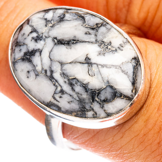 Sterling silver ring with oval white and black pinolith jasper cabochon, close-up