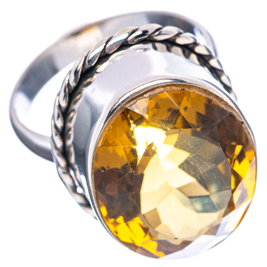 Sterling silver ring with yellow-gold oval faceted beer quartz, rope-style twisted shank
