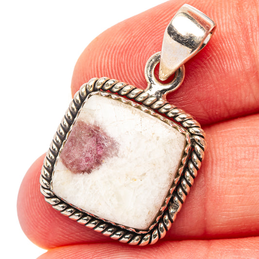 Pink tourmaline in quartz pendant with braided .925 sterling silver bezel