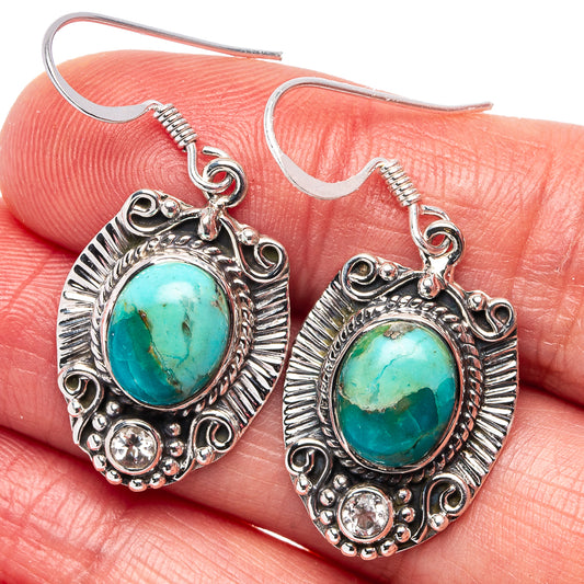Turquoise oval cabochon drop earrings in .925 sterling silver with round crystal accents