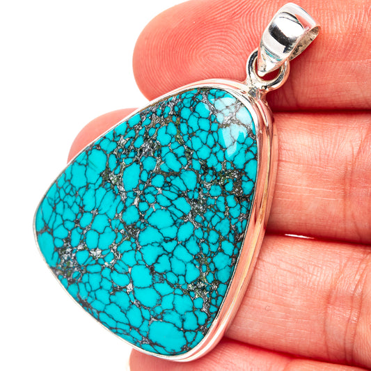 Turquoise heart pendant in .925 sterling silver with stone web pattern