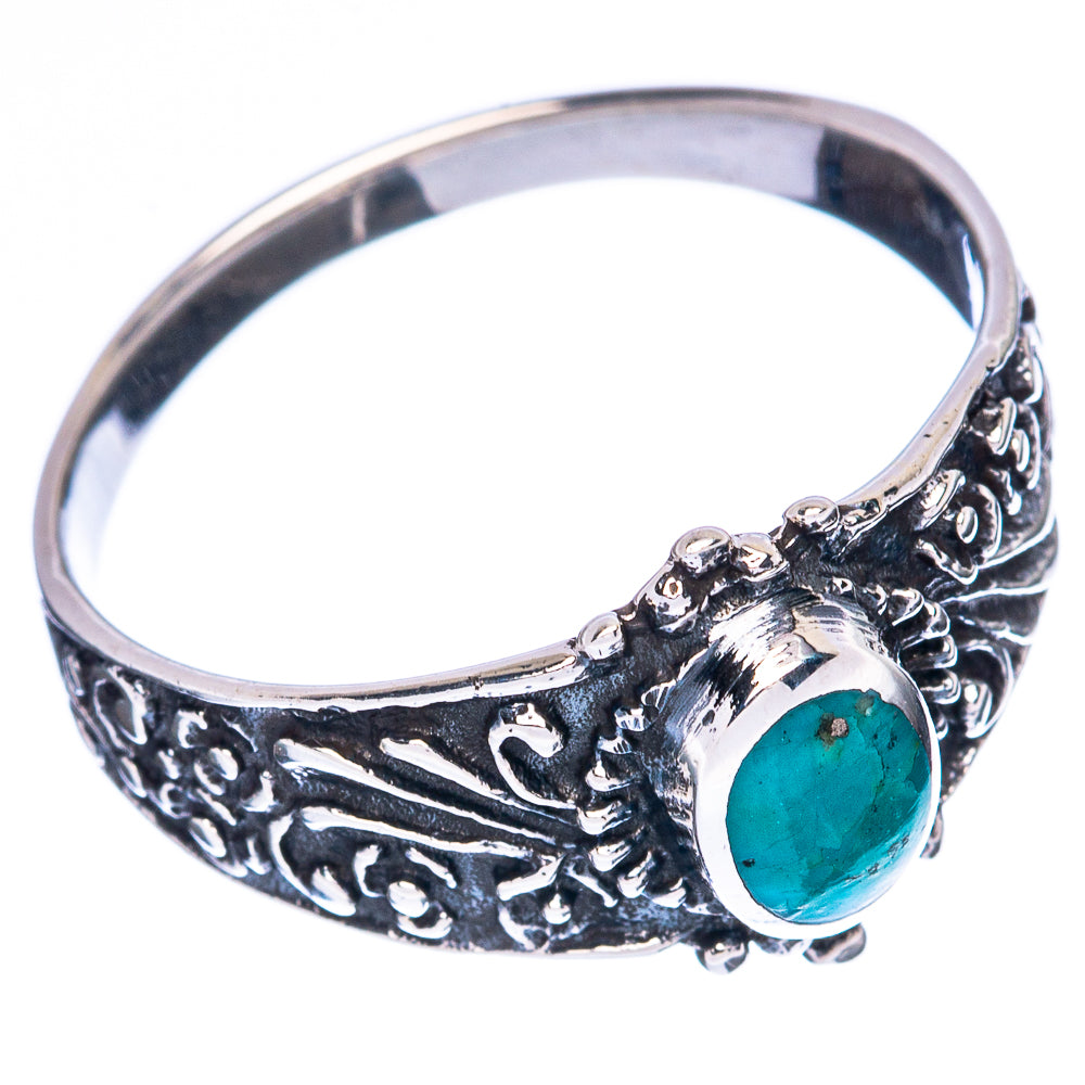 Sterling silver band ring with oval turquoise stone and detailed side filigree