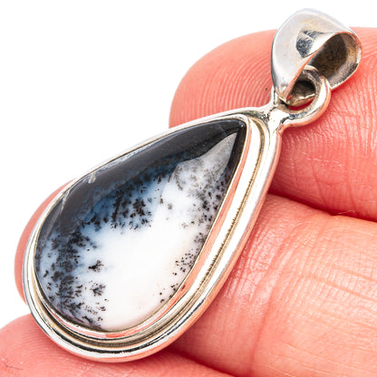 Dendritic opal teardrop pendant in sterling silver with white and dark blue stone