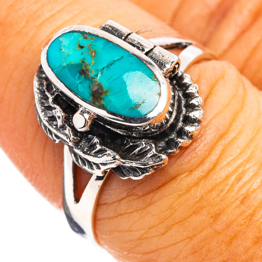 Sterling silver turquoise poison ring with oval blue-green cabochon, size 7.75