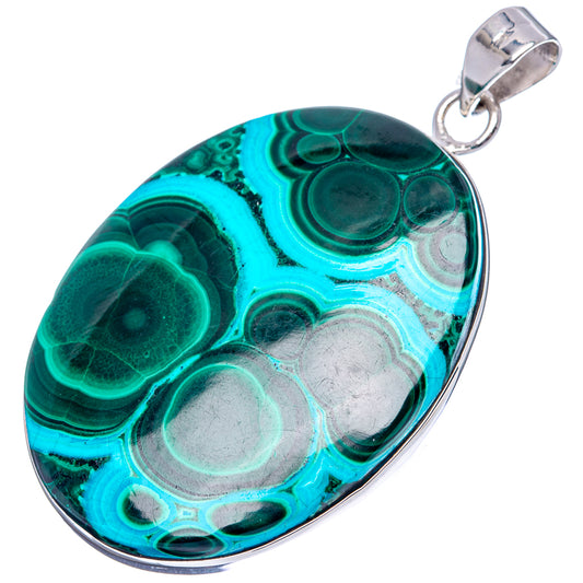 Oval malachite-chrysocolla stone pendant in sterling silver bezel, teal and green.