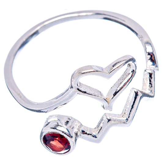Adjustable .925 sterling silver ring with heart motif and red garnet gemstone