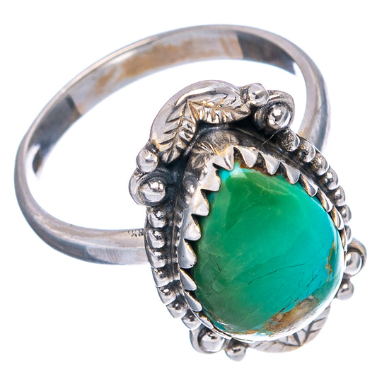 Sterling silver ring featuring oval green turquoise stone with ornate leaf setting