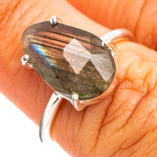 Sterling silver ring with faceted labradorite gemstone, dark teal flash