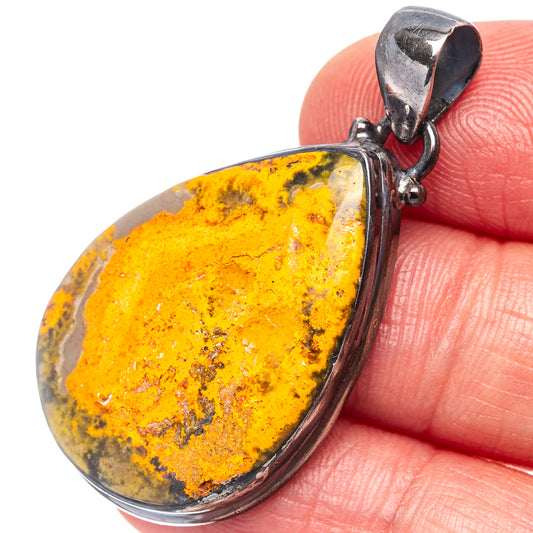 Teardrop amber-yellow bumblebee jasper pendant in .925 sterling silver setting