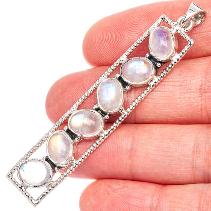 Sterling silver rainbow moonstone pendant with oval cabochons and chain link bail