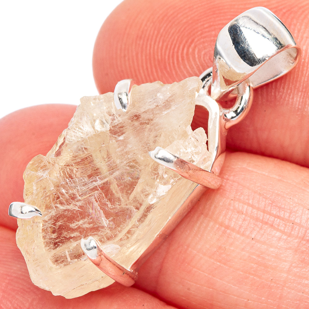 925 sterling silver prong-set pendant with rough light crystal stone and loop bail