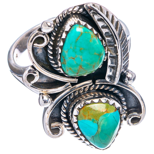 Sterling silver ring with large oval turquoise center stone and smaller teardrop stone