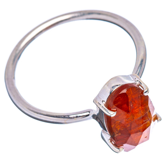 Oval orange kyanite ring bezel setting on .925 sterling silver band, size 7.75