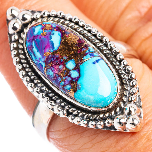 Oval turquoise and purple copper inlay sterling silver ring with beaded border