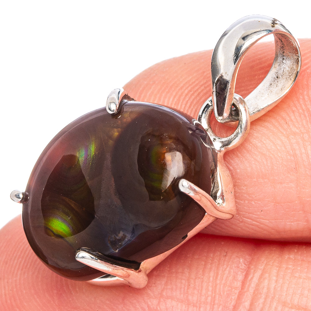 Sterling silver fire agate pendant with oval dark brown-red gemstone and prong setting