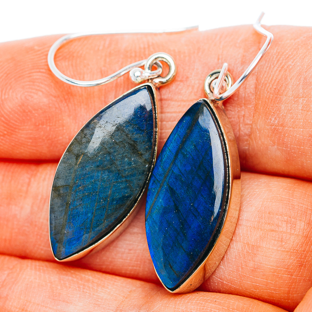 Labradorite earrings with blue teardrop stones and silver-tone hook backs