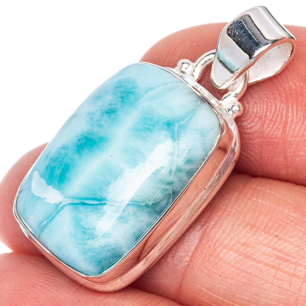 Blue larimar gemstone pendant with silver bail and bezel-set rectangular stone