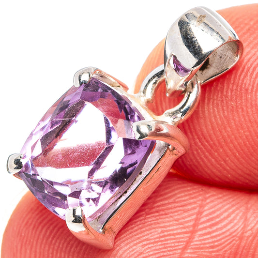 Amethyst pendant with faceted purple gemstone in sterling silver prong setting