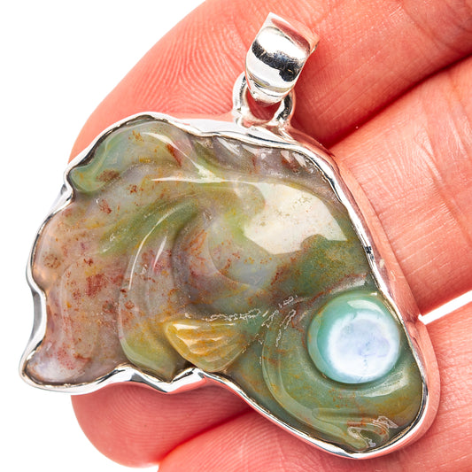 Ocean jasper pendant, irregular multicolor stone with teal orb, .925 sterling silver frame