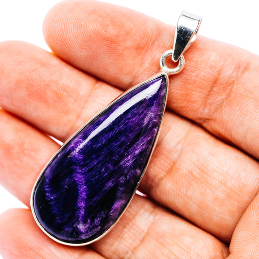 Large teardrop charoite pendant with .925 sterling silver frame and bail
