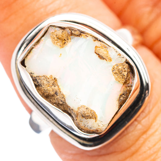 Sterling silver raw opal ring with rectangular bezel and speckled white opal