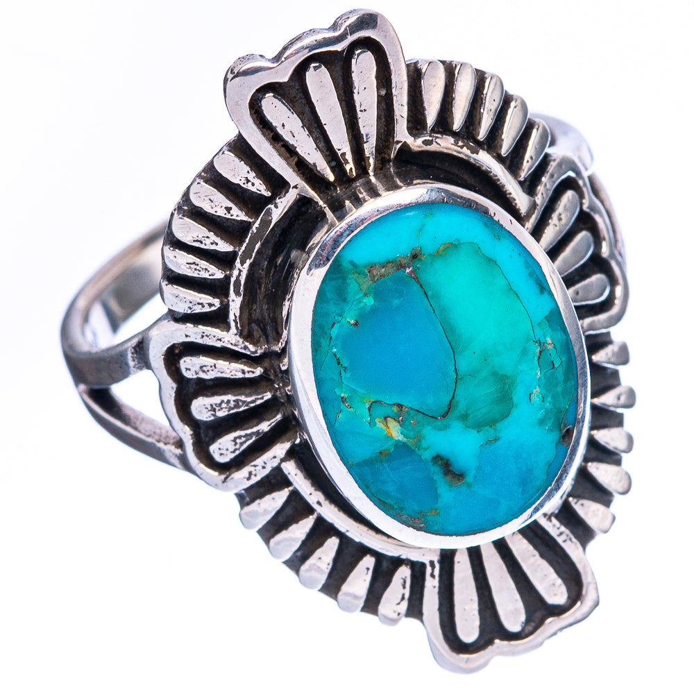 Turquoise oval cabochon sterling silver ring with raised sunburst metalwork