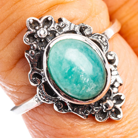 Dainty .925 sterling silver ring with oval turquoise-green amazonite stone and floral setting