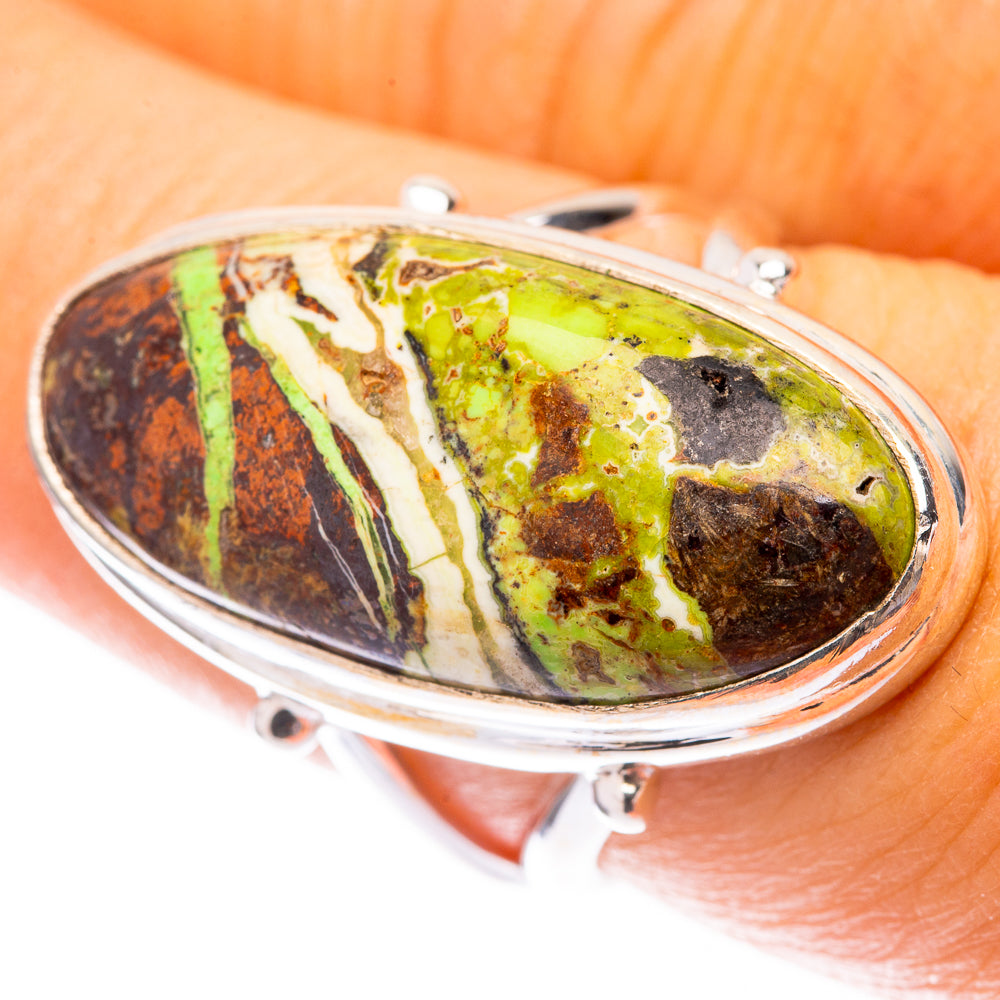 Sterling silver oval cabochon ring with green, brown, and cream stone