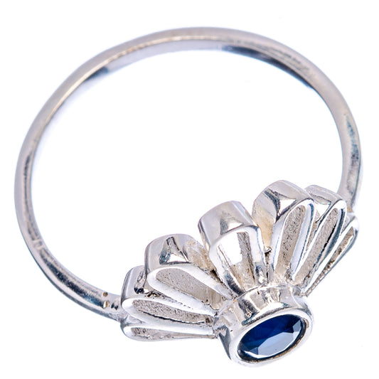 Sterling silver ring with raised daisy setting and blue oval gemstone, band view