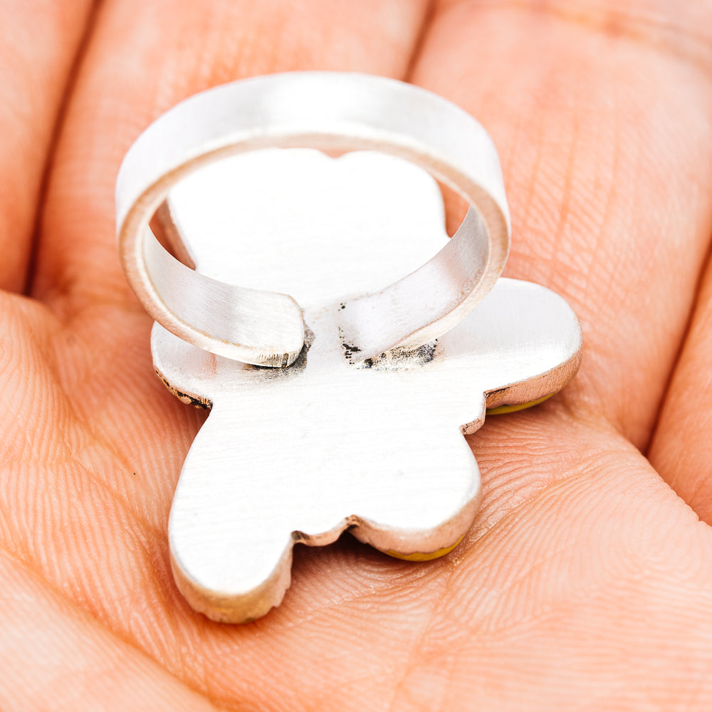 Adjustable sterling silver ring with open back band and plain underside