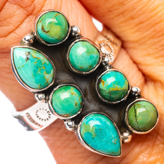 Turquoise oval gemstone ring in sterling silver with six bezel-set stones