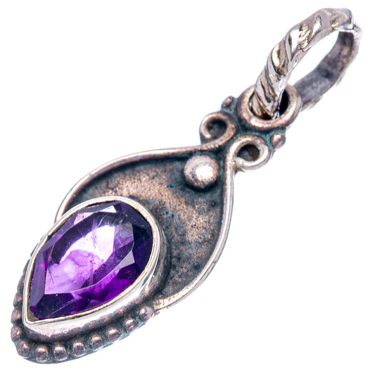 Sterling silver amethyst teardrop pendant with purple faceted gem in detailed bezel