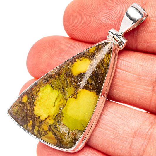 Gaspeite gemstone pendant in .925 sterling silver bezel, yellow-green stone with banded pattern.