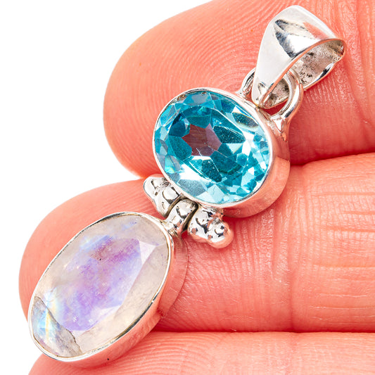 Close-up oval blue topaz and moonstone drop pendant with .925 sterling silver bail
