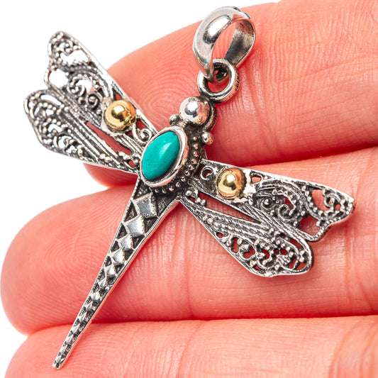 Turquoise dragonfly pendant in .925 sterling silver with oval turquoise center and bail