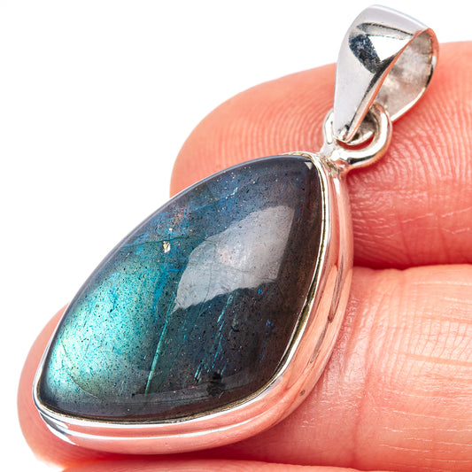 Sterling silver teardrop labradorite pendant, close-up view of blue stone in bezel bail