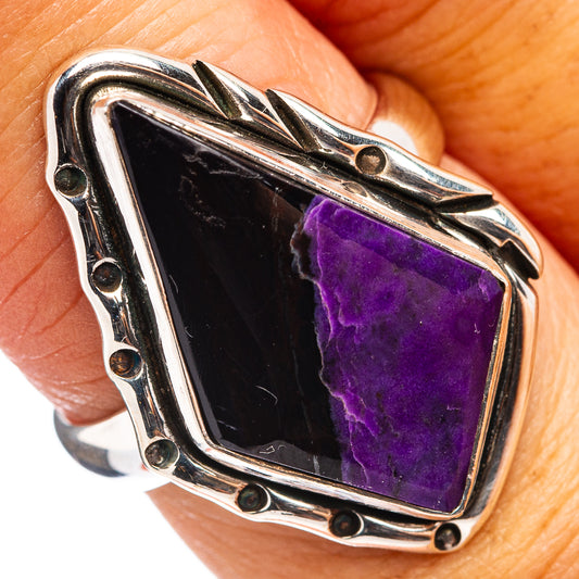Sterling silver ring with purple sugilite gemstone, bezel setting and rivet details