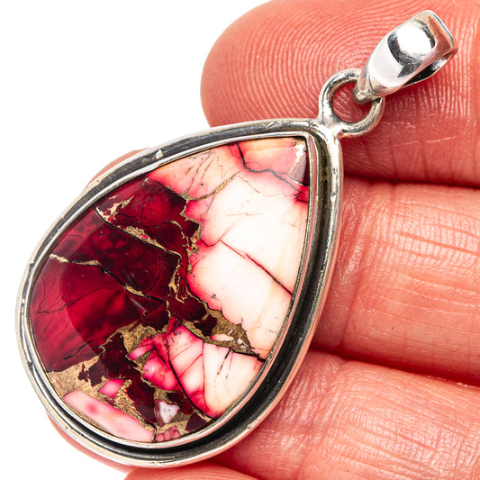 Teardrop gemstone pendant in .925 sterling silver with red, pink, and gold stone