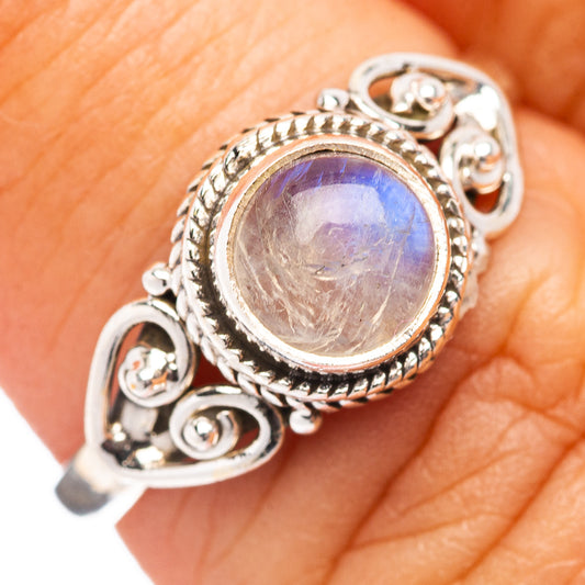 Sterling silver moonstone ring, oval rainbow center with decorative side scrolls