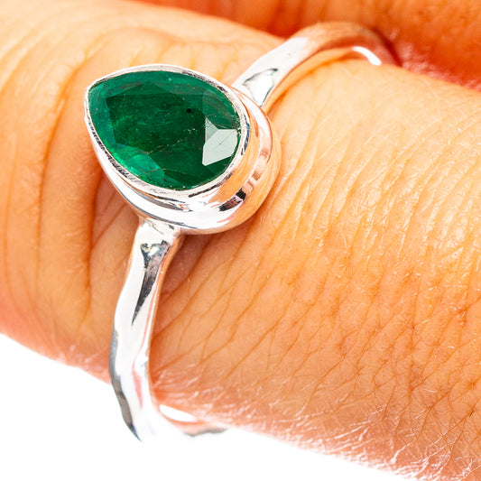 Sterling silver ring with green teardrop gemstone, polished band, size 9