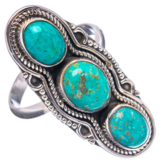 Ornate .925 sterling silver turquoise ring with three oval turquoise cabochons.