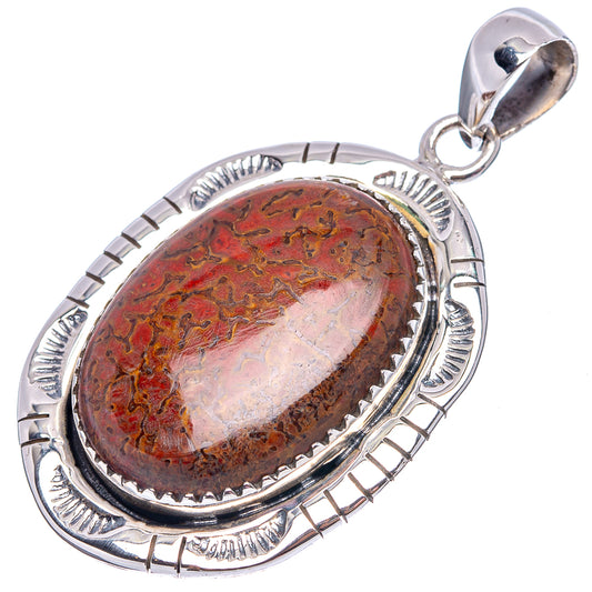Sterling silver oval pendant with red-brown dinosaur bone cabochon and hinged bail
