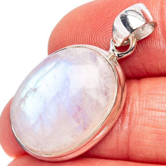 Oval moonstone pendant in .925 sterling silver bezel with loop bail