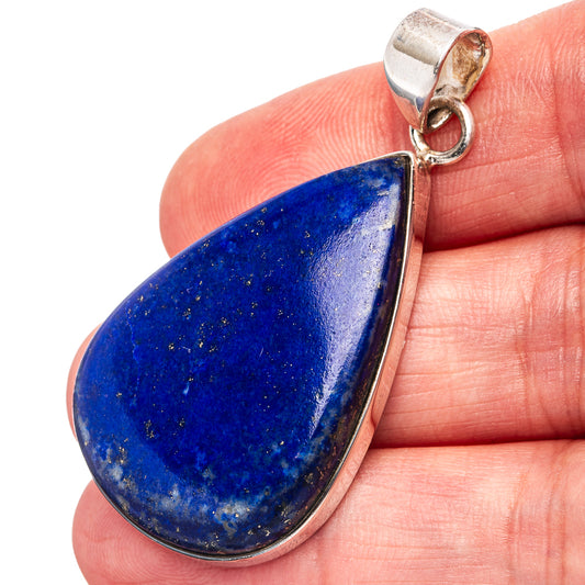 Teardrop lapis lazuli pendant in .925 sterling silver bezel with loop bail